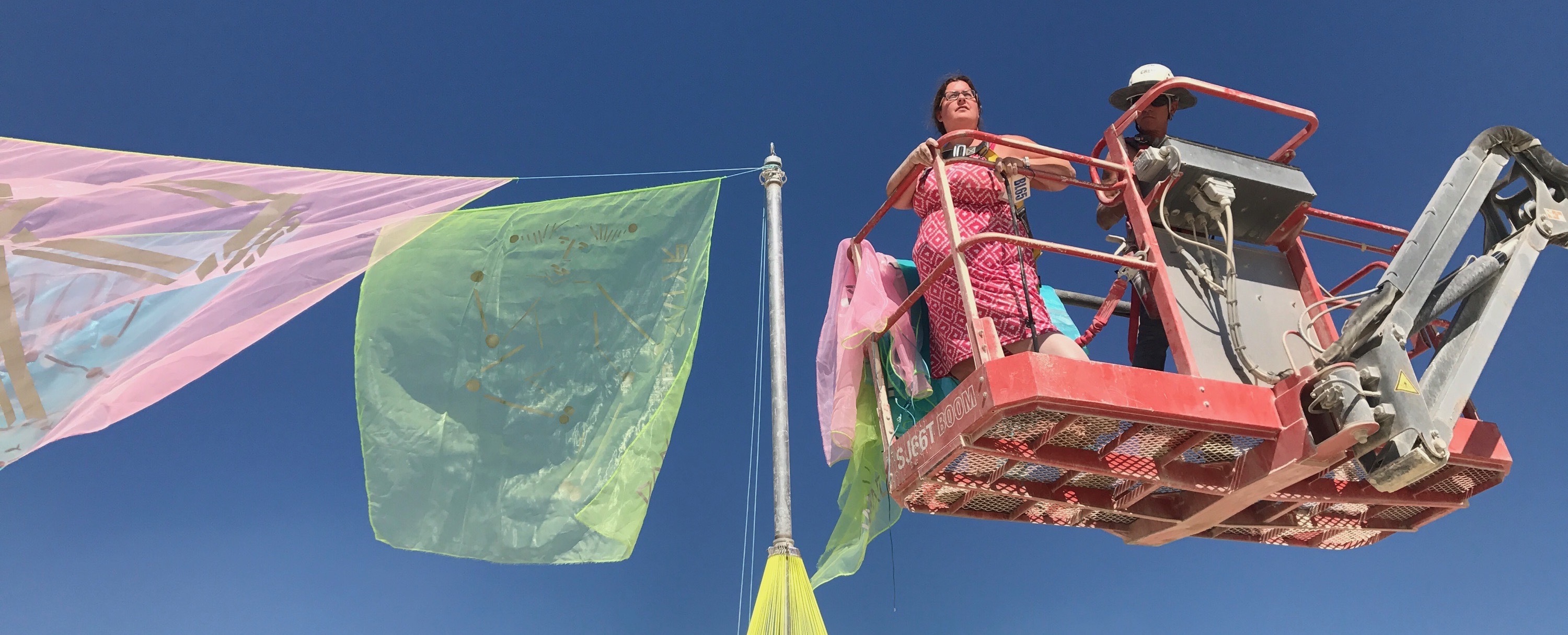 Hapto on a boom lift installing Variable Stars